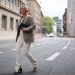 COLOGNE, GERMANY - JUNE 18: Franzi Koenig wearing black Mango heels, beige Zara pants, khaki ARKET blazer, black Chanel leather bag, Chimi eyewear shades and Fafe Collection jewelry on June 18, 2021 in Cologne, Germany. (Photo by Jeremy Moeller/Getty Images)